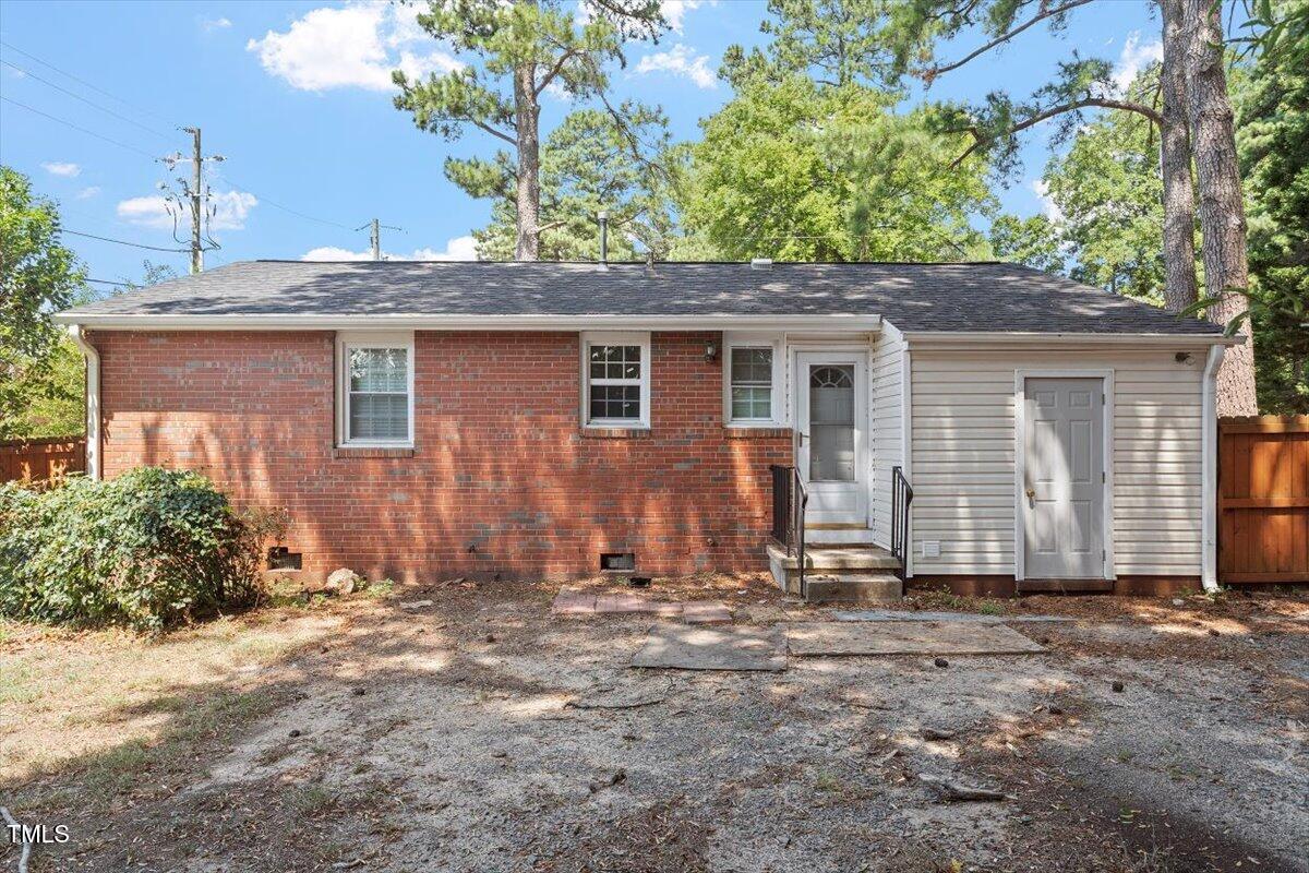 1621 Seminole Trail Raleigh, NC 27609 - Photo 21 of 25 a view of a house with a yard