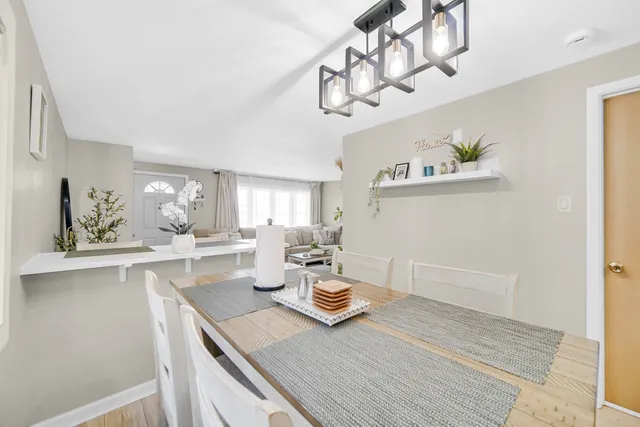 a kitchen with stainless steel appliances a sink stove and cabinets