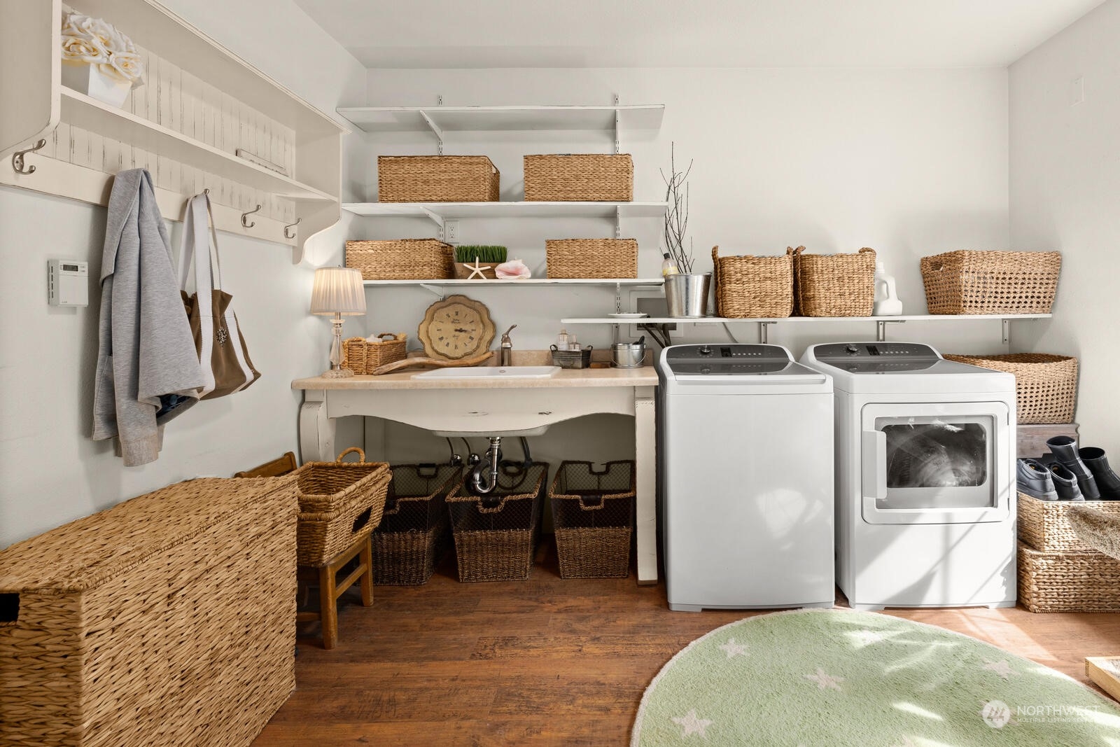 525 192nd Place Southeast Bothell, WA 98012 - Photo 18 of 40 a workspace with stainless steel appliances granite countertop a stove and a refrigerator