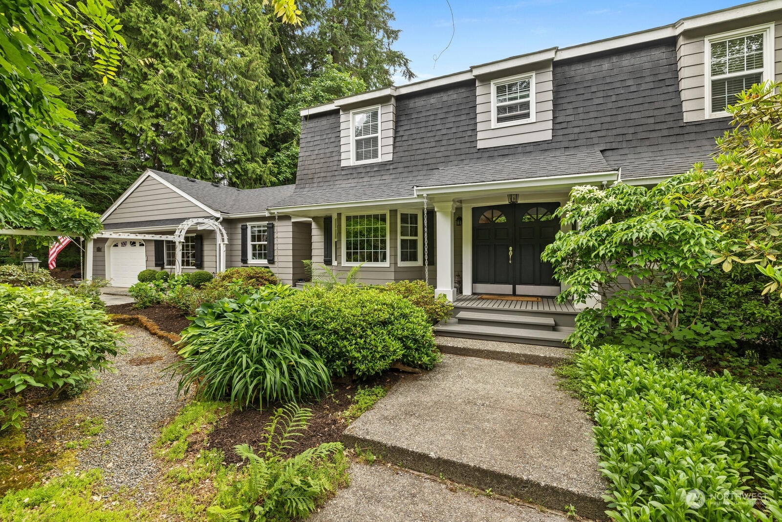 525 192nd Place Southeast Bothell, WA 98012 - Photo 2 of 40 a front view of a house with a yard