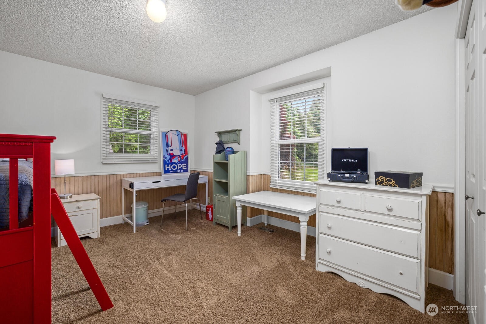 525 192nd Place Southeast Bothell, WA 98012 - Photo 26 of 40 a bedroom with furniture and a wooden floor