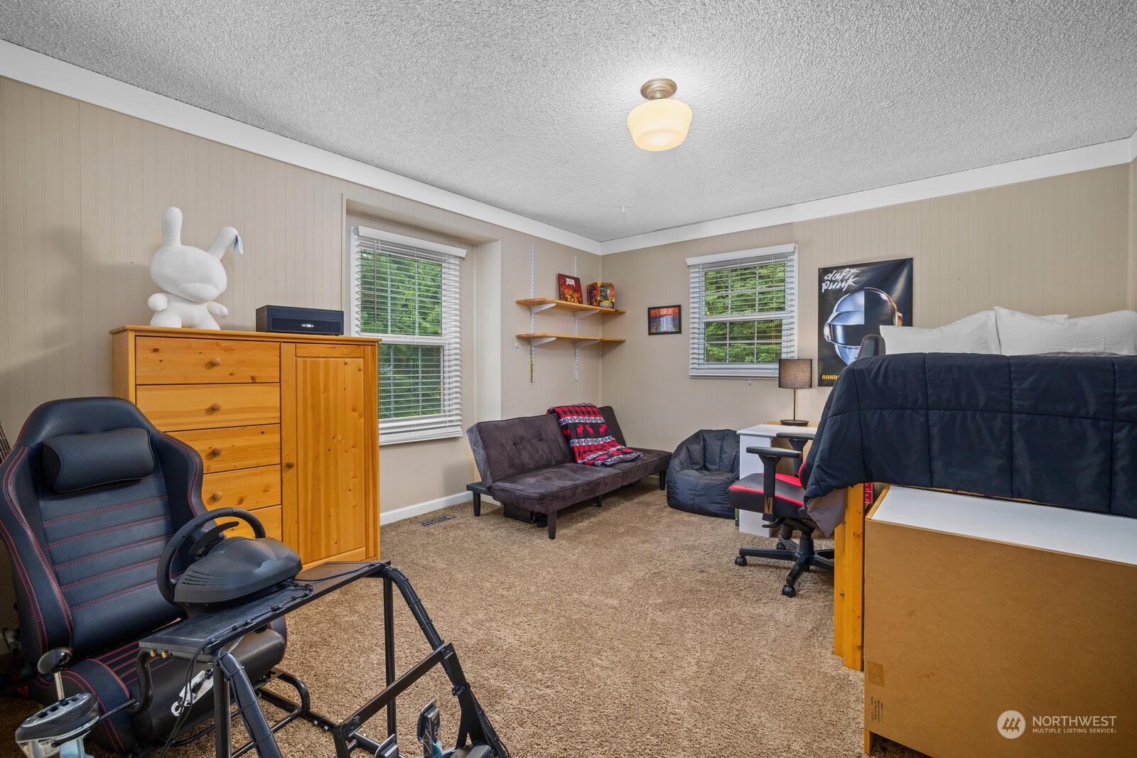 525 192nd Place Southeast Bothell, WA 98012 - Photo 28 of 40 a bedroom with furniture and a window