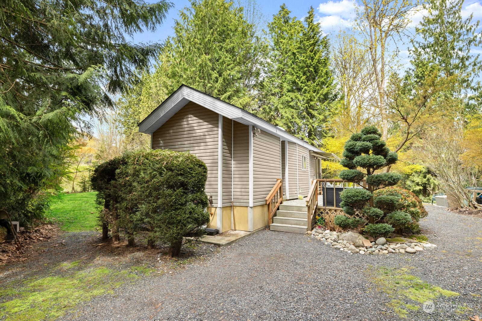 525 192nd Place Southeast Bothell, WA 98012 - Photo 37 of 40 a front view of a house with a yard and garage