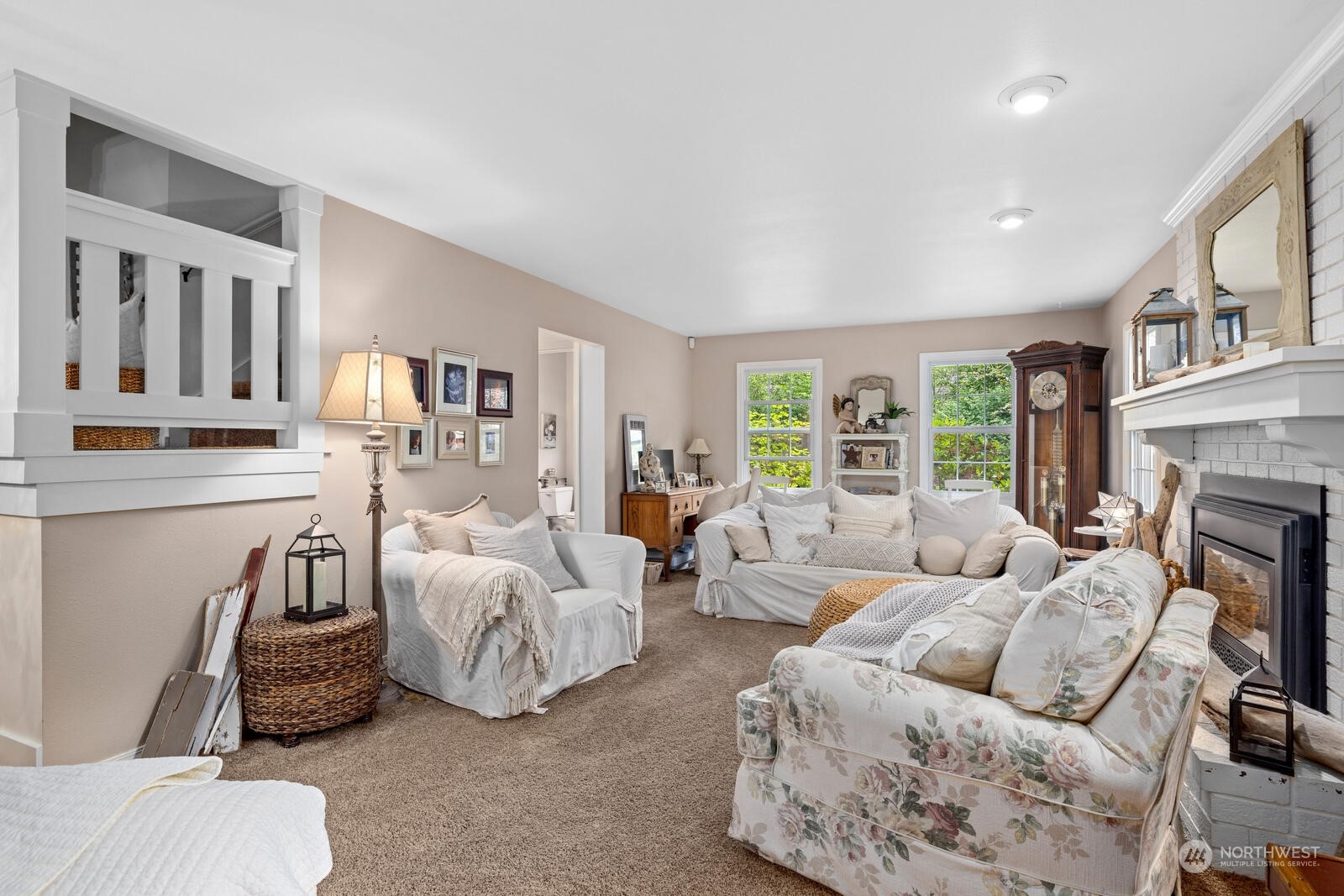 525 192nd Place Southeast Bothell, WA 98012 - Photo 6 of 40 a living room with furniture and a fireplace