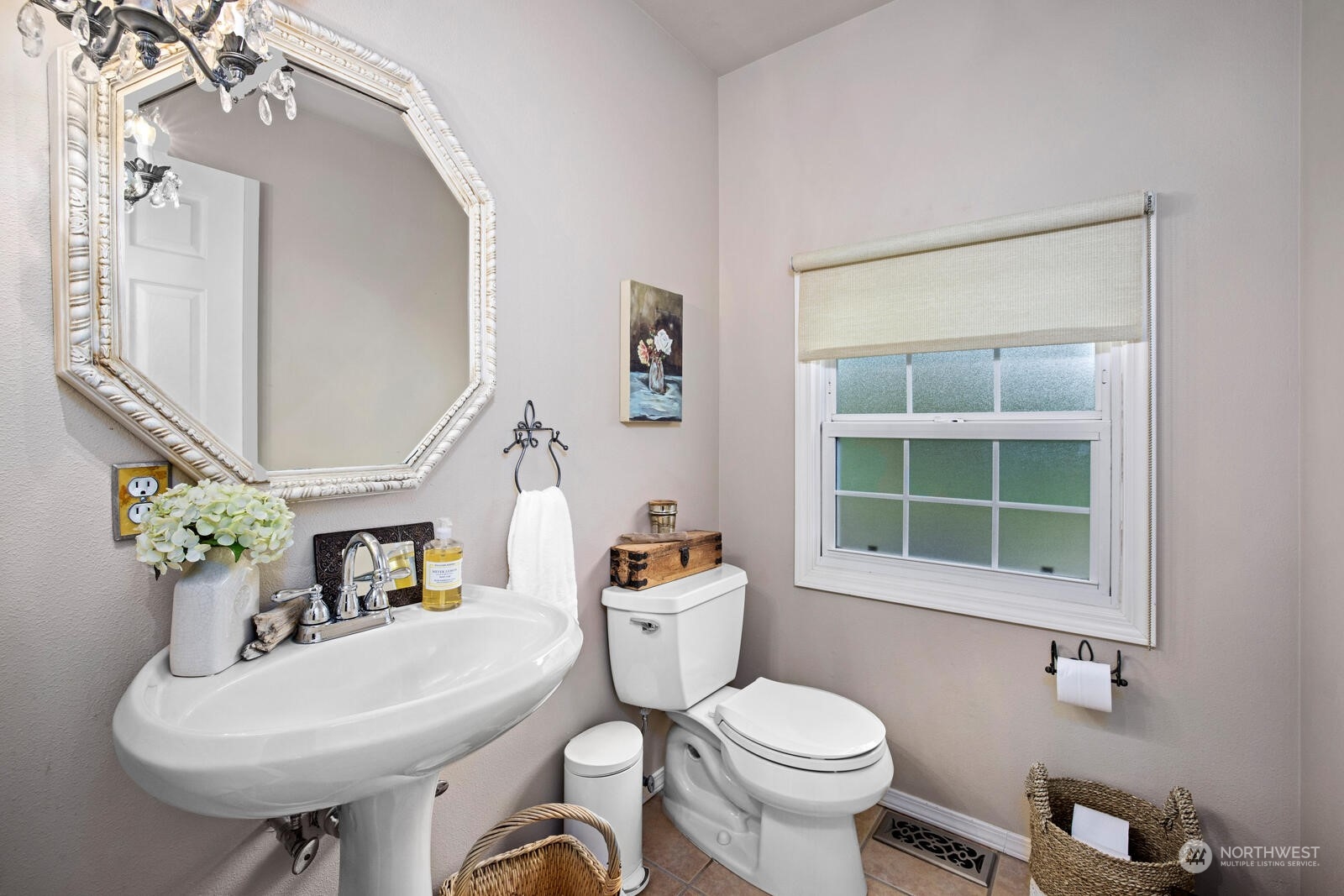 525 192nd Place Southeast Bothell, WA 98012 - Photo 7 of 40 a bathroom with a sink mirror toilet and next to a window