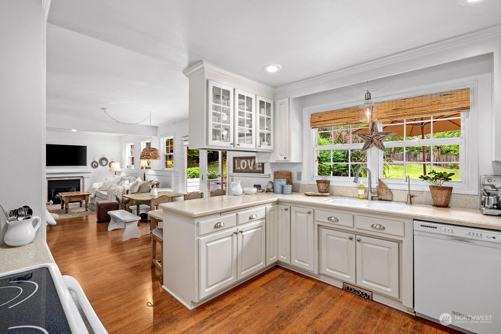 525 192nd Place Southeast Bothell, WA 98012 - Photo 8 of 40 a kitchen with a sink stove and cabinets