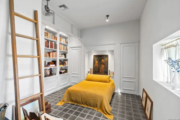 a kitchen with a sink cabinets and stove