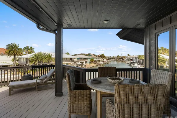 a view of a porch with seating space