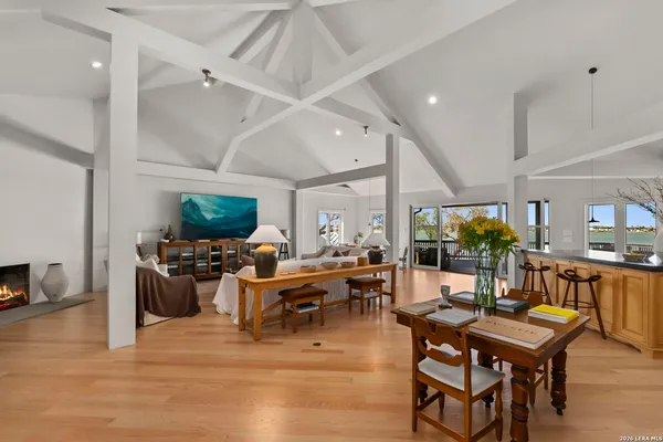 a kitchen with a table and chairs in it