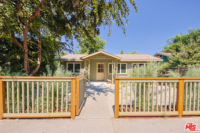 a front view of a house with a porch