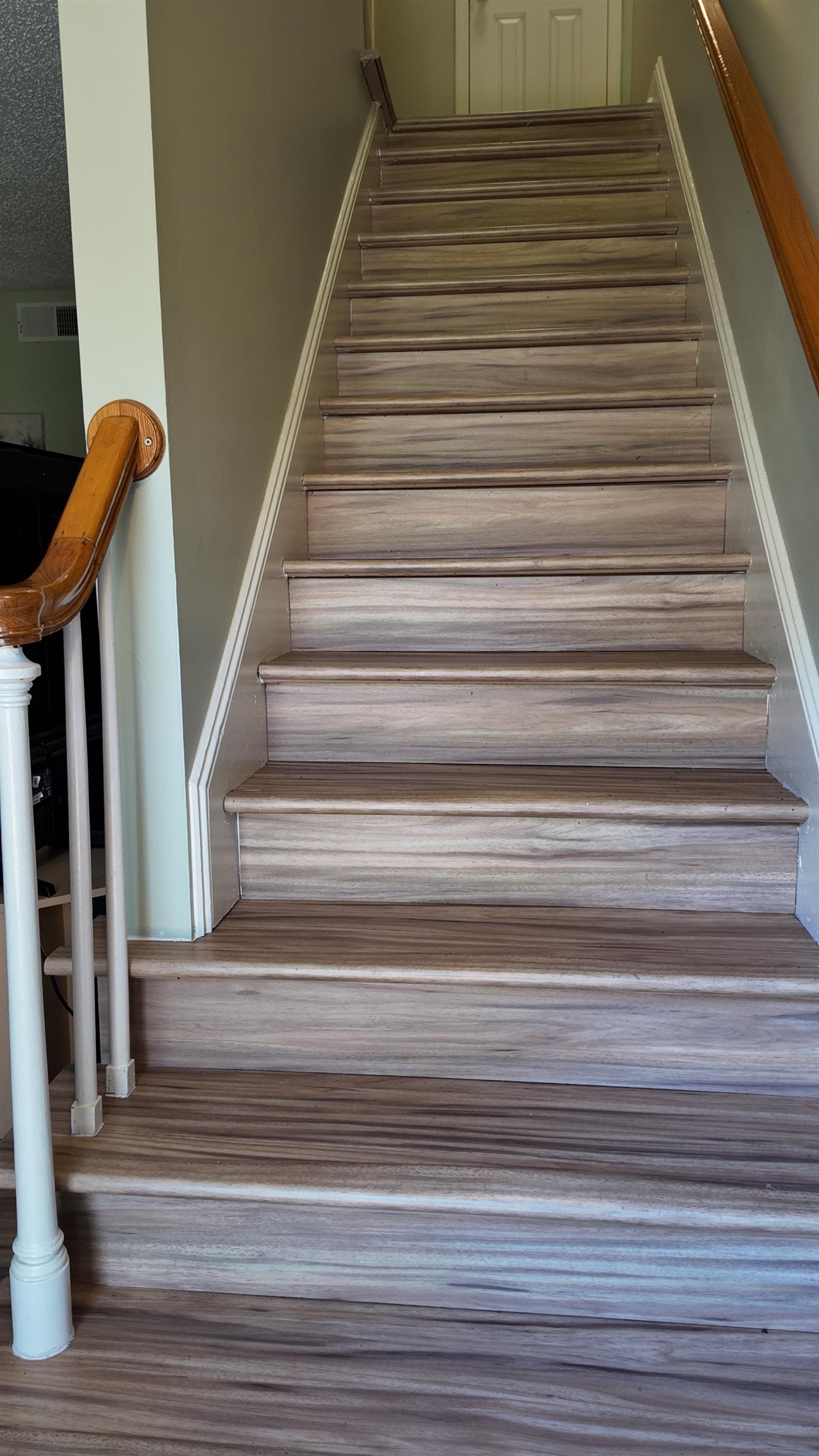 1462 Dover Road Spartanburg, SC 29301 - Photo 17 of 30 Upgraded luxury vinyl stairs.