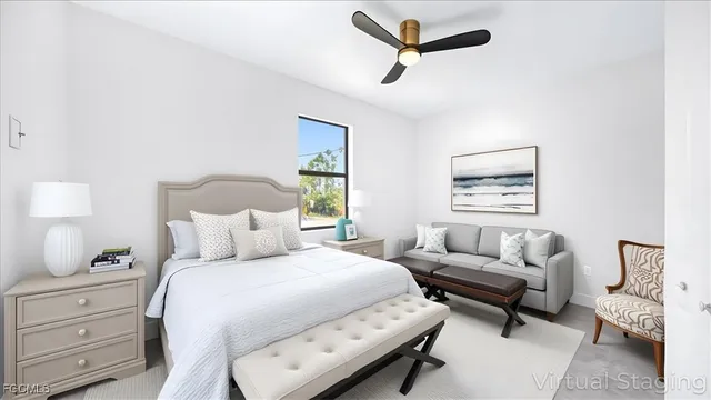 a bedroom with a bed and a couch