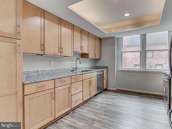 136 Welcome Alley, Unit TH2 Baltimore, MD 21201 - Photo 11 of 39 Modern kitchen with sleek finishes.