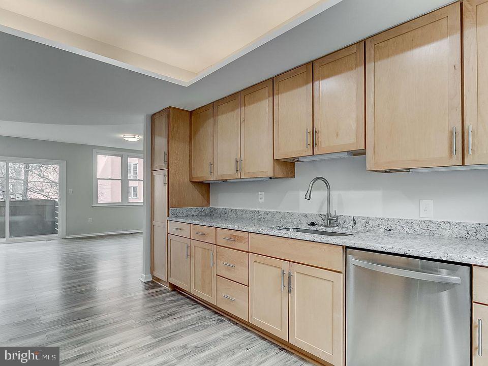 136 Welcome Alley, Unit TH2 Baltimore, MD 21201 - Photo 13 of 39 Modern kitchen with sleek finishes.