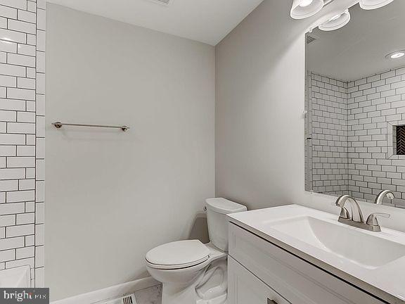136 Welcome Alley, Unit TH2 Baltimore, MD 21201 - Photo 18 of 39 Sleek modern bathroom with elegant tiles.