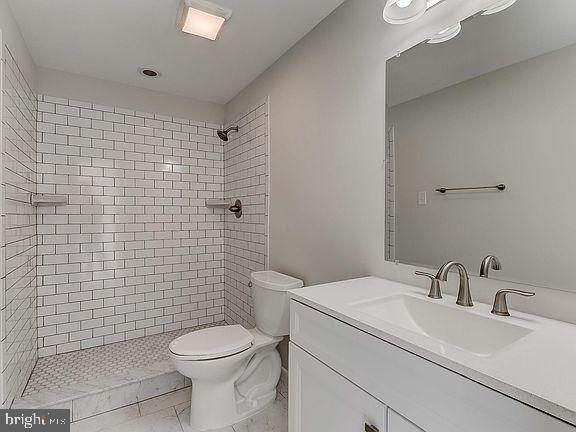 136 Welcome Alley, Unit TH2 Baltimore, MD 21201 - Photo 24 of 39 Sleek modern bathroom with tile accents.