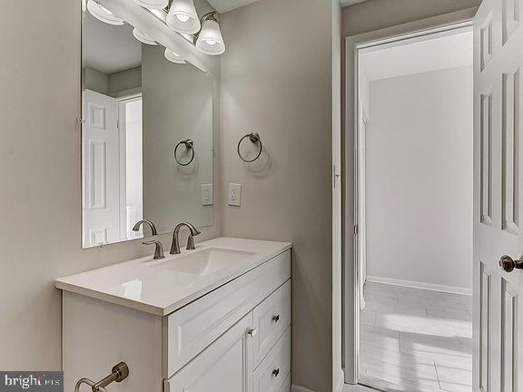 136 Welcome Alley, Unit TH2 Baltimore, MD 21201 - Photo 26 of 39 Sleek modern bathroom with bright accents.