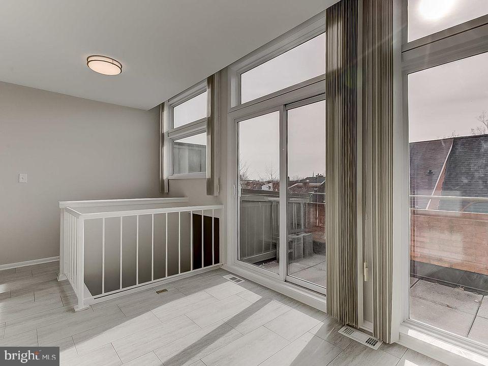 136 Welcome Alley, Unit TH2 Baltimore, MD 21201 - Photo 31 of 39 Bright, airy space with modern design.