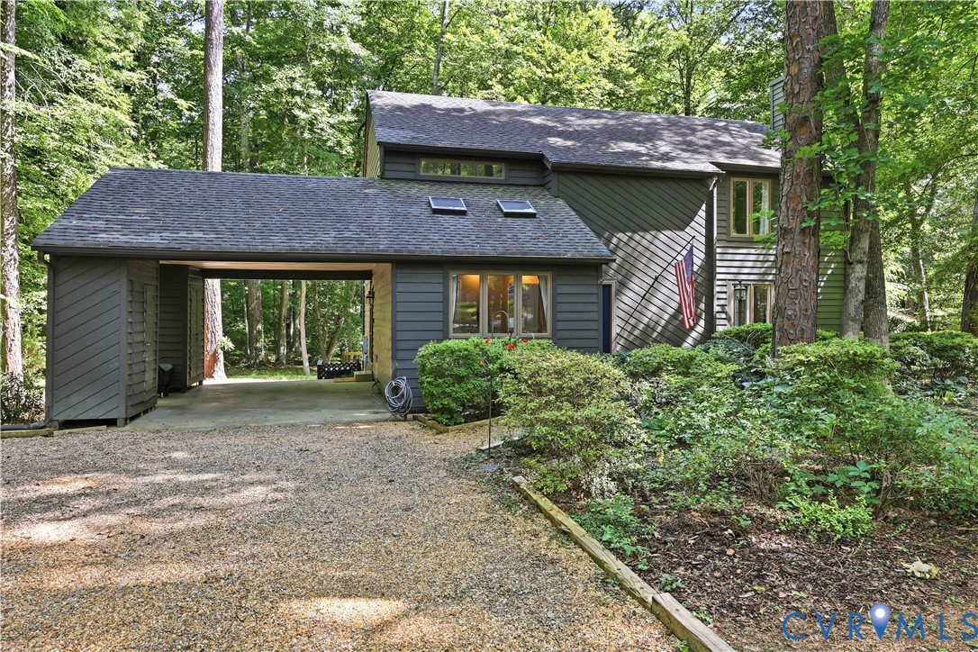 13622 Winterberry Ridge Midlothian, VA 23112 - Photo 1 of 47 a front view of a house with garden
