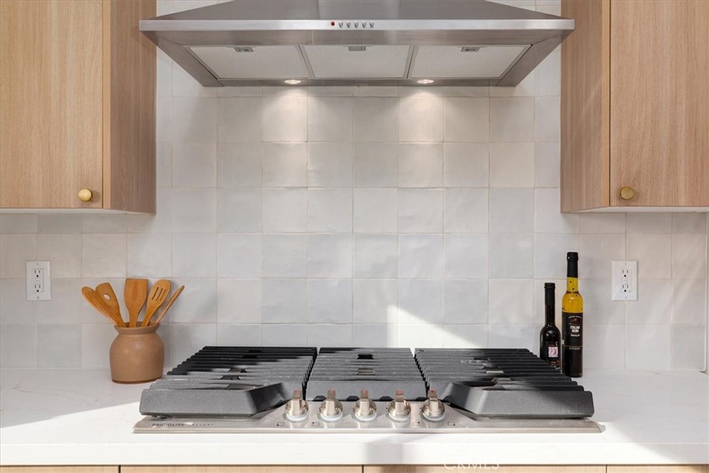 26002 Adamor Road Calabasas, CA 91302 - Photo 13 of 39 a table and chairs in a room