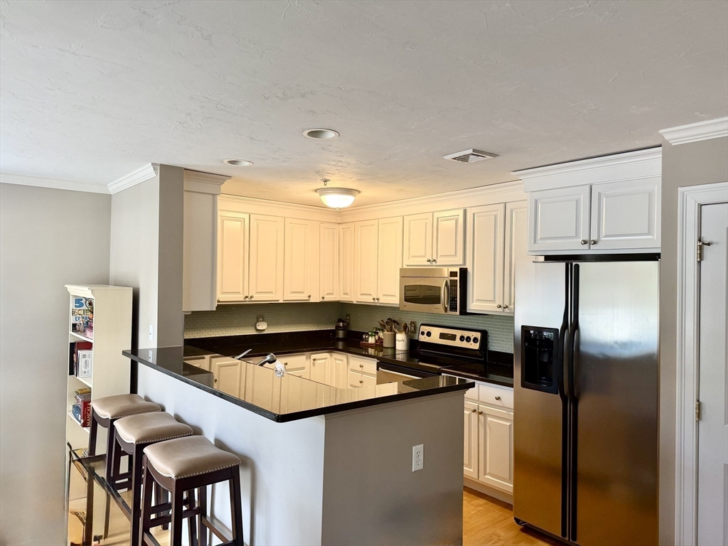 27 Maple Street, Unit F Canton, MA 02021 - Photo 2 of 22