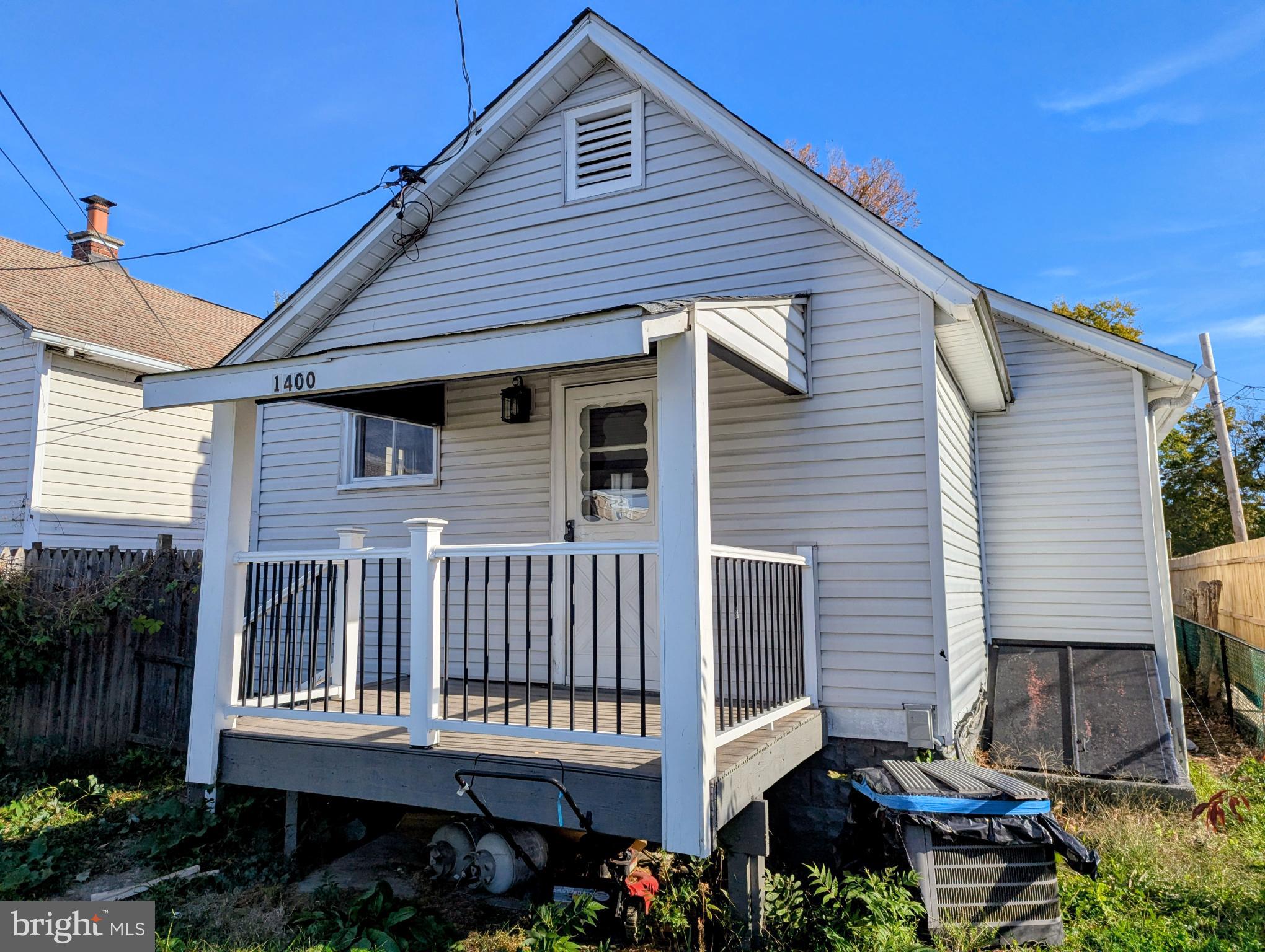 1400 Beale Street Marcus Hook, PA 19061 - Photo 17 of 17 a view of a house with wooden deck and furniture