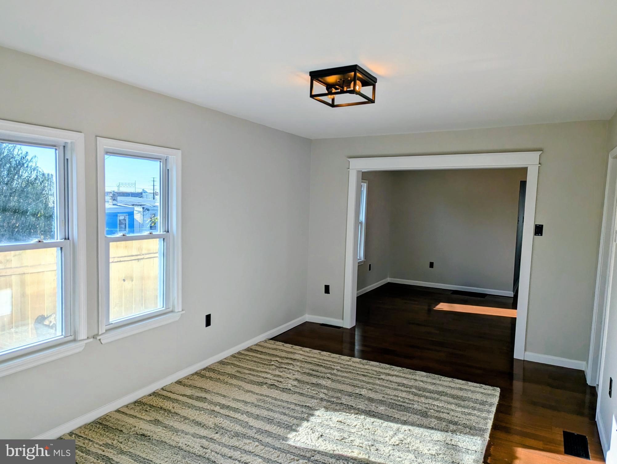 1400 Beale Street Marcus Hook, PA 19061 - Photo 8 of 17 a bedroom with a bed and a window