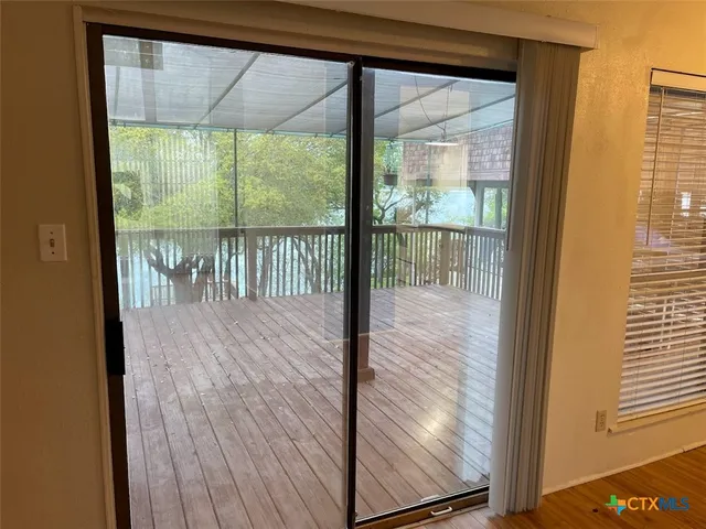 a view of a glass door with a glass door