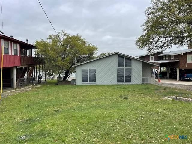 a house view with a garden space