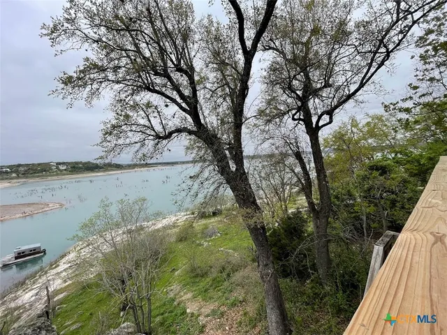 a view of a lake from a balcony