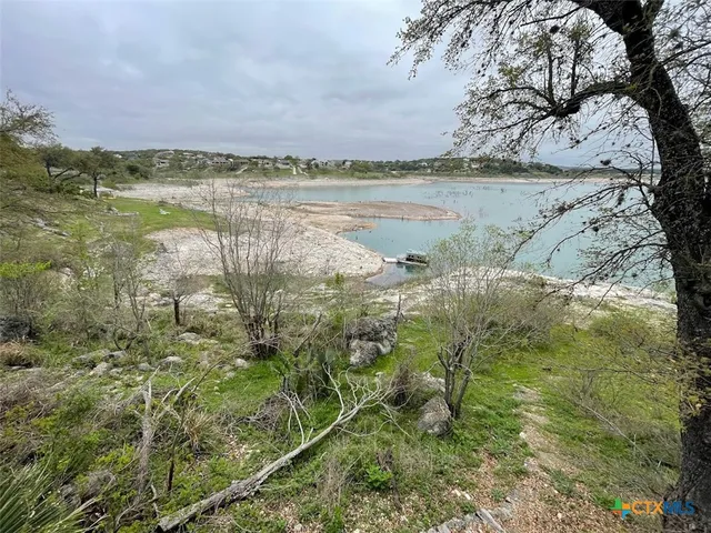 a view of lake with mountain