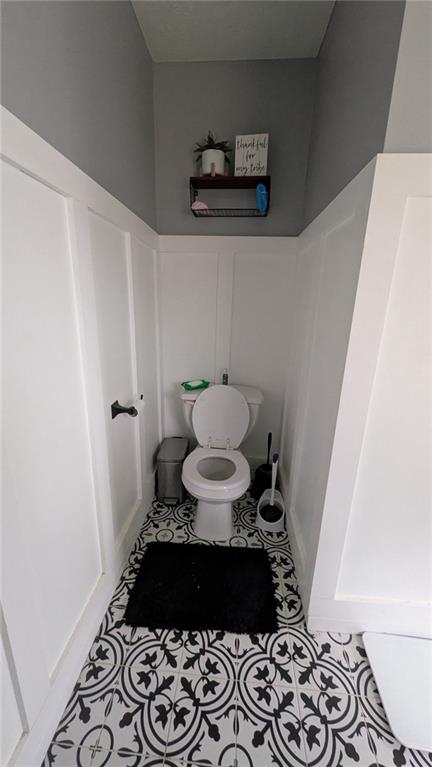 230 Overlook Drive Covington, GA 30016 - Photo 11 of 34 a bathroom with a sink and a mirror