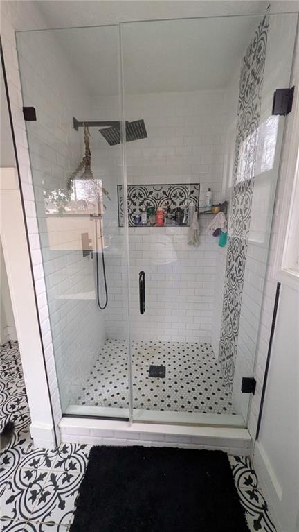 230 Overlook Drive Covington, GA 30016 - Photo 13 of 34 a bathroom with a shower