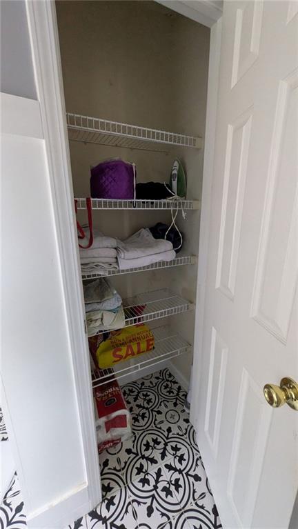 230 Overlook Drive Covington, GA 30016 - Photo 17 of 34 a room with storage and utility