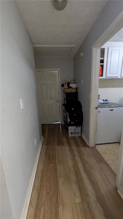 230 Overlook Drive Covington, GA 30016 - Photo 25 of 34 a view of utility room with closet and wooden floor