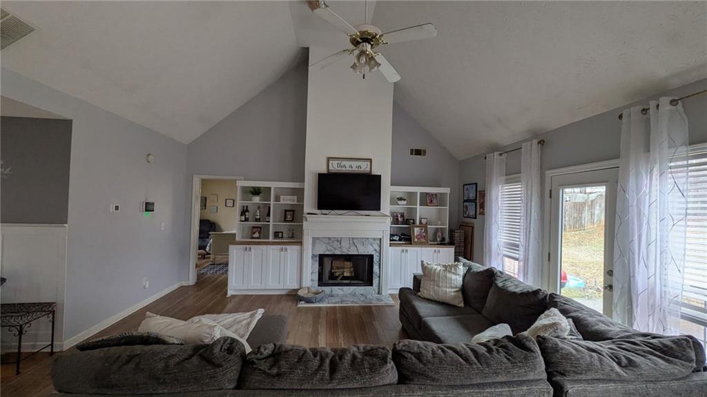 230 Overlook Drive Covington, GA 30016 - Photo 5 of 34 a living room with furniture fireplace and flat screen tv