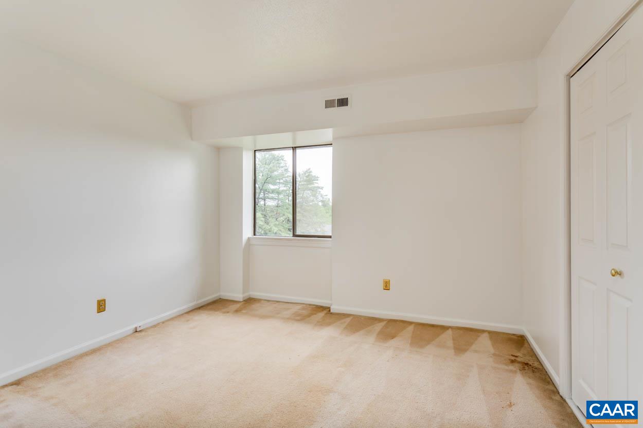 24 Spring Court Charlottesville, VA 22901 - Photo 13 of 23 an empty room with a window