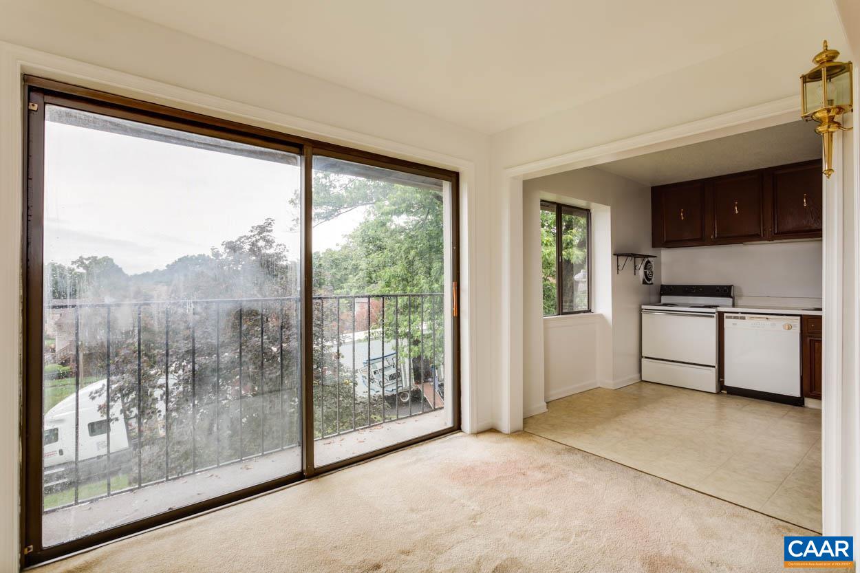 24 Spring Court Charlottesville, VA 22901 - Photo 5 of 23 a view of workspace with window and furniture