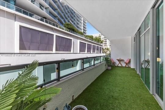 3301 Northeast 1st Avenue, Unit L0202 Miami, FL 33137 - Photo 17 of 25 a view of a house with a yard