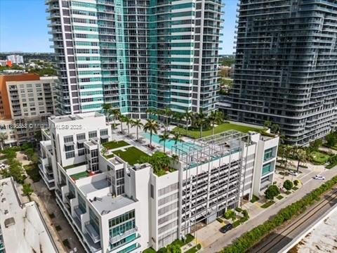3301 Northeast 1st Avenue, Unit L0202 Miami, FL 33137 - Photo 19 of 25 a view of a balcony with chairs