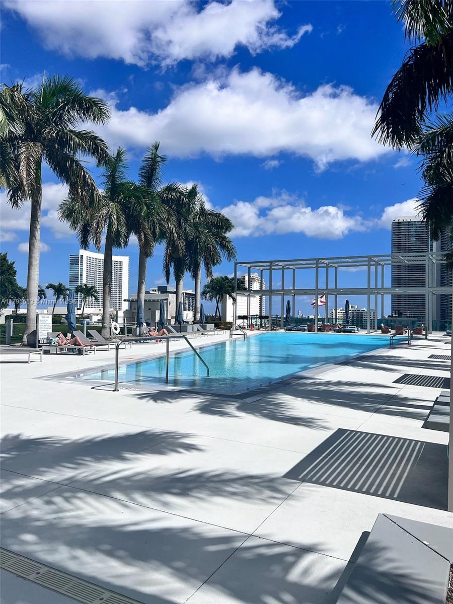 3301 Northeast 1st Avenue, Unit L0202 Miami, FL 33137 - Photo 21 of 25 a view of residential houses with palm trees