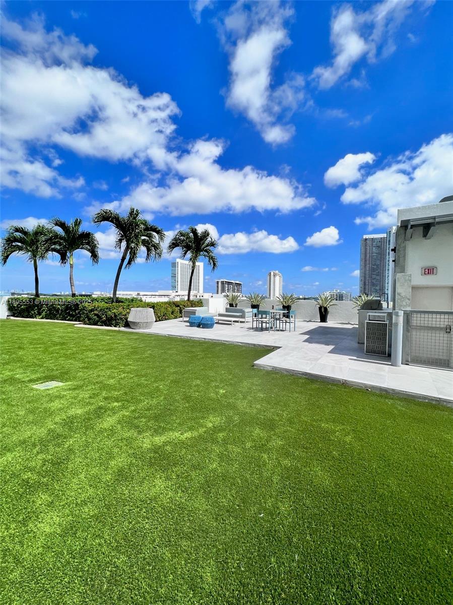 3301 Northeast 1st Avenue, Unit L0202 Miami, FL 33137 - Photo 24 of 25 a view of yard with outdoor seating