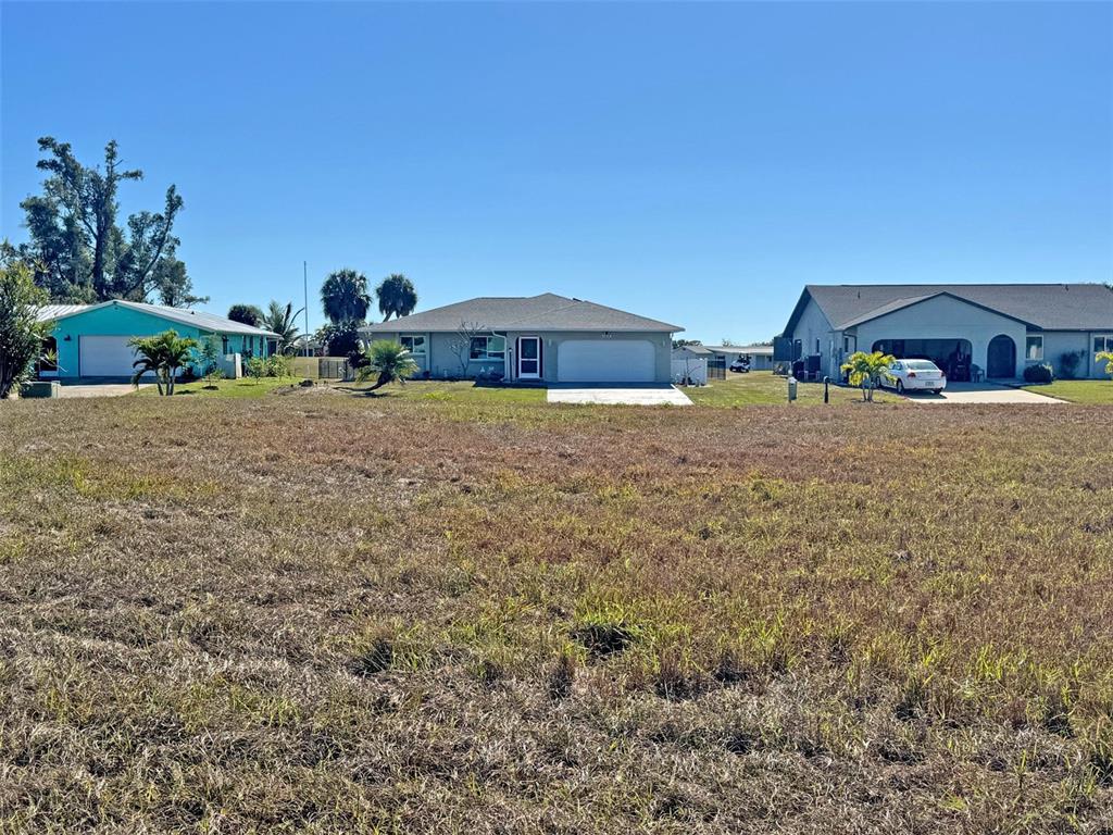 151 Caddy Road Rotonda West, FL 33947 - Photo 8 of 12 a house view with a outdoor space