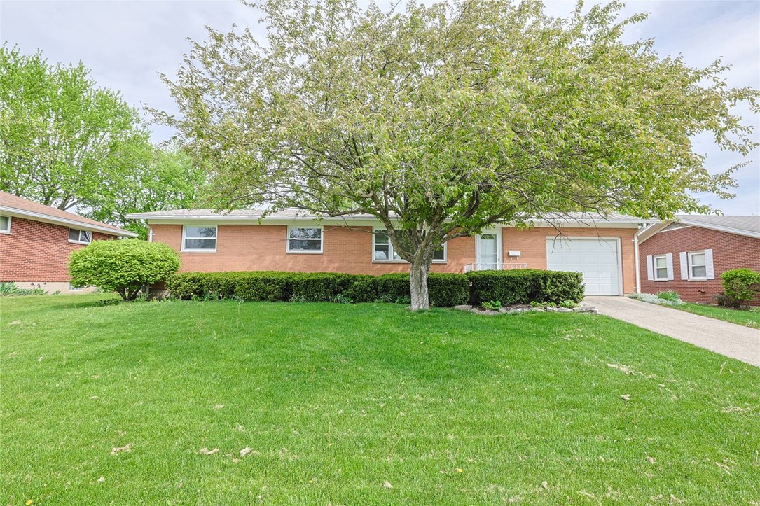 452 Cookston Avenue Springfield, OH 45503 - Photo 1 of 34 This classic brick residence offers a well-maintained exterior and inviting curb appeal.
