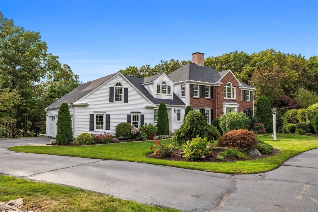 15 Stafford Road Lynnfield, MA 01940 - Photo 36 of 39 a front view of a house with a yard