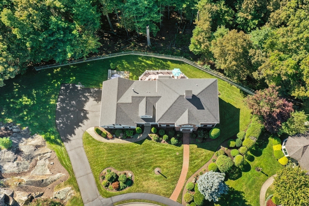 15 Stafford Road Lynnfield, MA 01940 - Photo 4 of 39 an aerial view of a house with swimming pool and garden