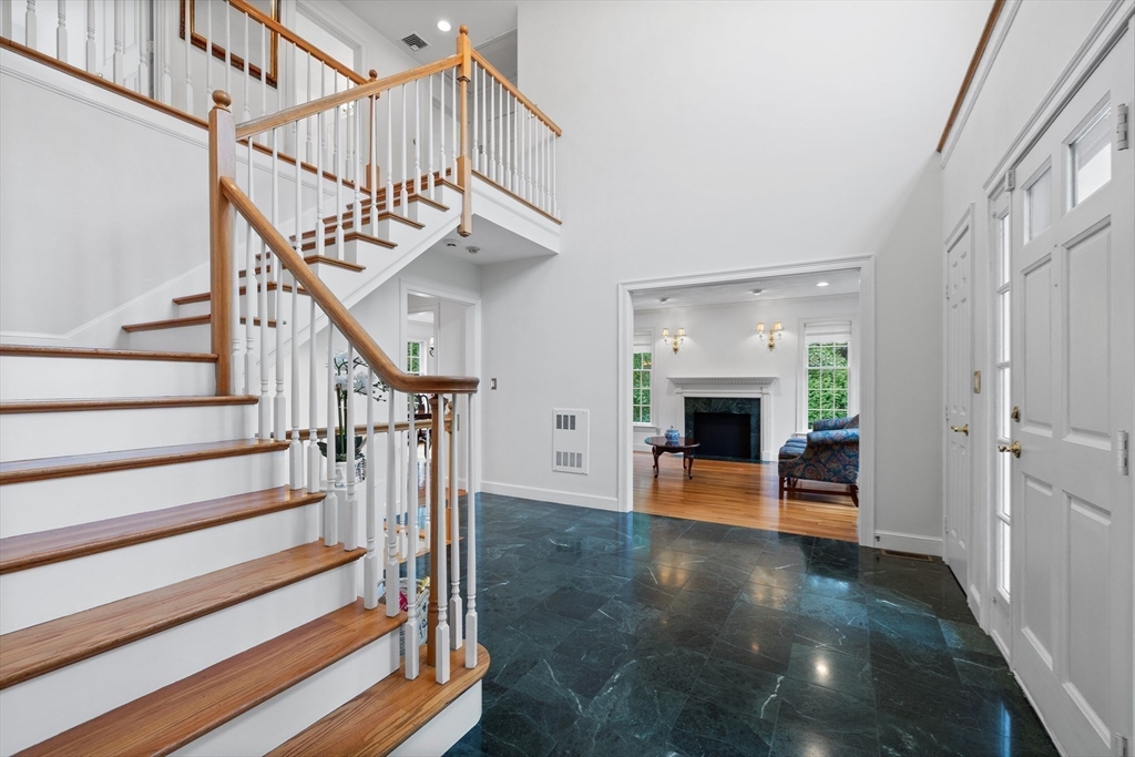 15 Stafford Road Lynnfield, MA 01940 - Photo 5 of 39 a view of entryway and hall with wooden floor