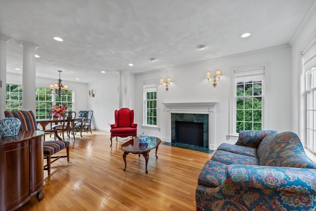 15 Stafford Road Lynnfield, MA 01940 - Photo 8 of 39 a living room with furniture and a fireplace