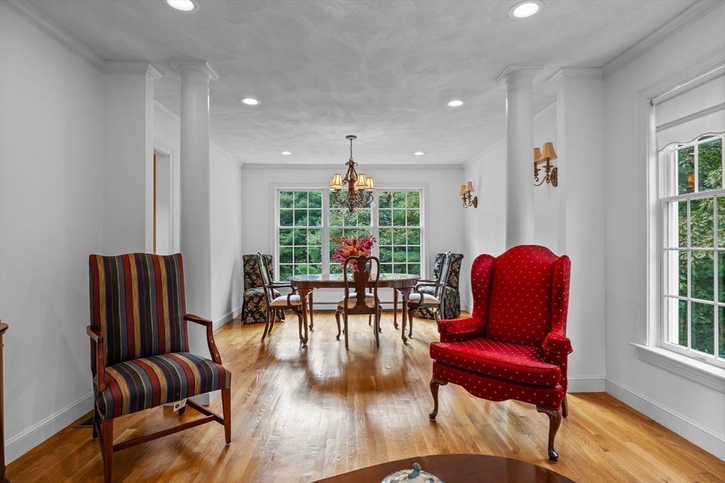15 Stafford Road Lynnfield, MA 01940 - Photo 10 of 39 a living room with furniture and a large window