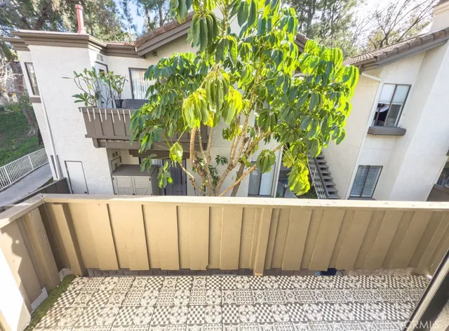 a wooden door in a backyard